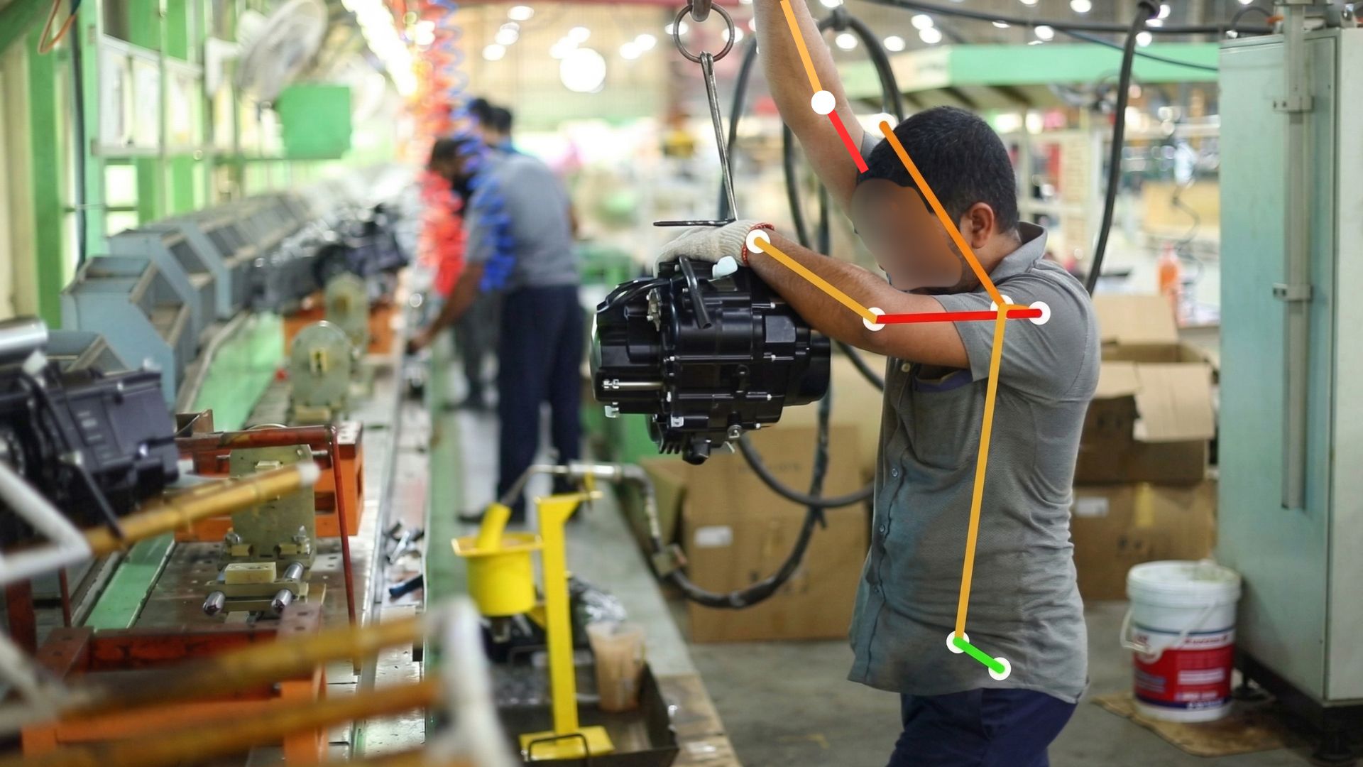 ErgoEdge AI ergonomic risk assessment -- posture skeleton overlay detecting overhead reach risk in manufacturing